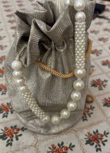 Elegant Pearl Embellished Potli Bag