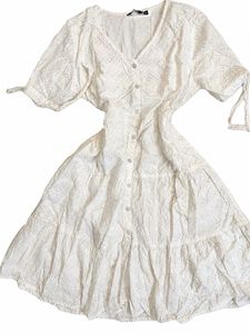 White embroidered ruffle mini dress