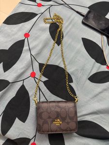Coach Monogram Mini Bag