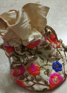 Creamish Potli Bag