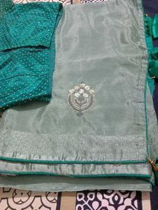 Stunning Teal Saree with Embellished Blouse
