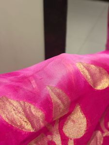 Elegant Pink Saree with Golden Motifs