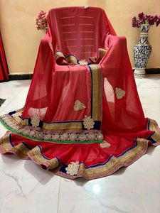 Elegant Red Embroidered pearl work Saree