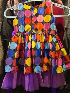 Vibrant Polka Dot Dress with Purple Accents