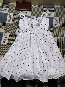 a cute bow short dress I got it from sarojini mark
