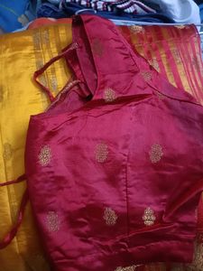 Yellow saree with red blouse