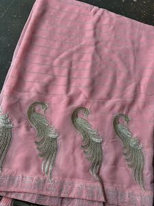 Elegant Pink Saree with Peacock Motif