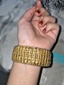 One Hand Exquisite Gold Tone Bracelet.