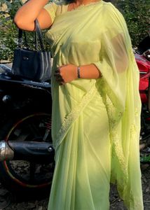 Elegant Light Green Embroidered Saree