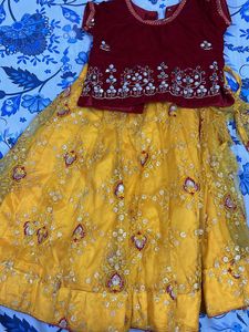 Red Velvet Choli With Yellow Net Lehnga