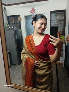 Elegant Beige & Orange Saree