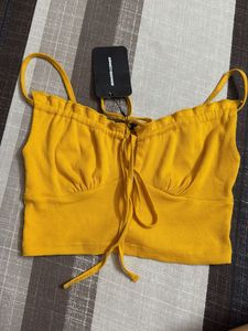 its a crop fitted top from bonker corner
