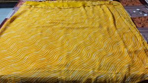 Vibrant Yellow laheriya Saree with Blouse