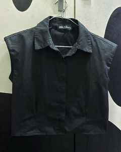 Sleeveless Black Button-Up Shirt