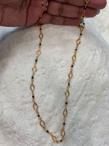 Elegant Gold Chain with Black Beads