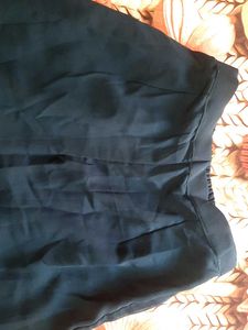 Elegant Teal Kurta Set with Embellished Top
