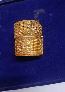 Exquisite Gold Bangle with Stones