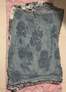 Elegant Floral Print Saree with Polka Dot Blouse