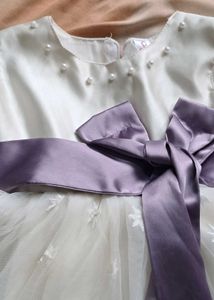 Elegant White Baby Dress with Purple Bow