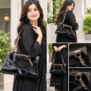 Chic Black Patent Handbag with Gold Chain
