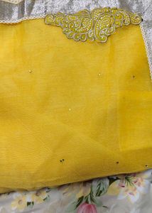 Vibrant Yellow Saree with paisley motifs