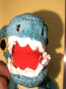 Cute Teal Dinosaur Plush bag tag
