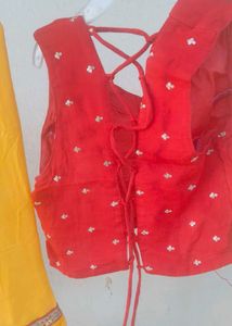 Vibrant Yellow Flared sharara and red choli duppat