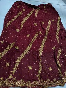 Exquisite Maroon &amp; Gold Embellished Lehenga Choli