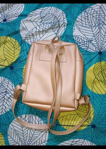 Rose Gold Cutout Mini Backpack