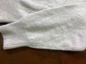 white button neckline sweater