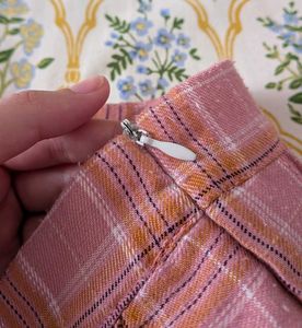 pink pleated checked skirt