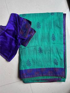 Beautiful Teal Saree with Purple Blouse