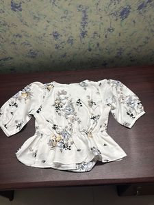 Floral Peplum Blouse with Embellished Waist