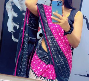 Elegant Pink, white  & black Printed Saree bl
