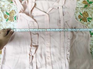 Chic Pink Ruffled Sleeveless Blouse