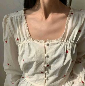 White Peplum Blouse with Red Floral Embroidery