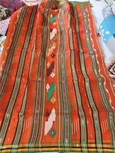 Vibrant Orange Saree with Geometric Pattern