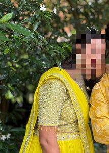 Vibrant Yellow Sequined prestitched Lehenga Choli