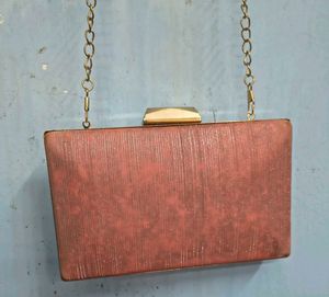Elegant Peach Clutch with Gold Chain