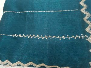 Elegant Teal Saree with Silver Border
