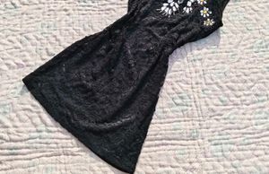 Small piece black mini dress