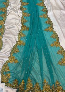 Stunning Teal Saree with Gold Embroidery