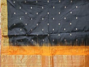Elegant Black & Orange Gold Saree