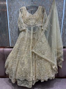 Amazing golden Peplum long Front Cut Lehga