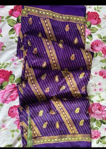 Vibrant Purple Saree with Gold Embroidery