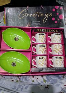 Elegant Tea Cup Set with Leaf Plates
