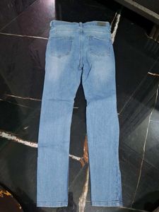 Ripped Light Wash Denim Jeans