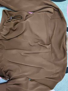 Brown shirt pattern top with bow in front