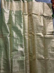 Elegant Gold Saree with Tassels