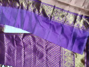 Elegant Peach Saree with Peacock Border